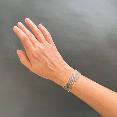 Brazalete Telar Dorado Delgado Liso Gris Traslúcido